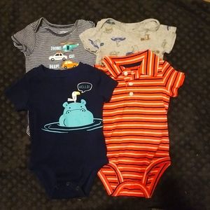 Bundle of Carter's 9 M Bodysuits